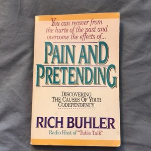 Pain and pretending by Rich Buhler